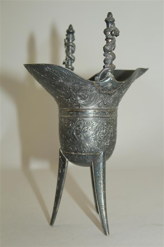 A late 19th century Japanese silver model of a Chinese archaic jue, 11 oz.